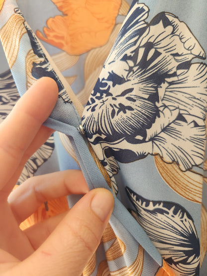 Pre-loved Blue floral playsuit size 8