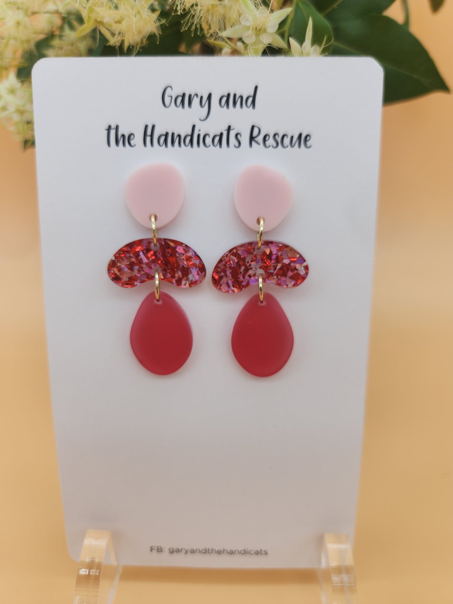 Our 'Love Me' acrylic stud dangle earrings