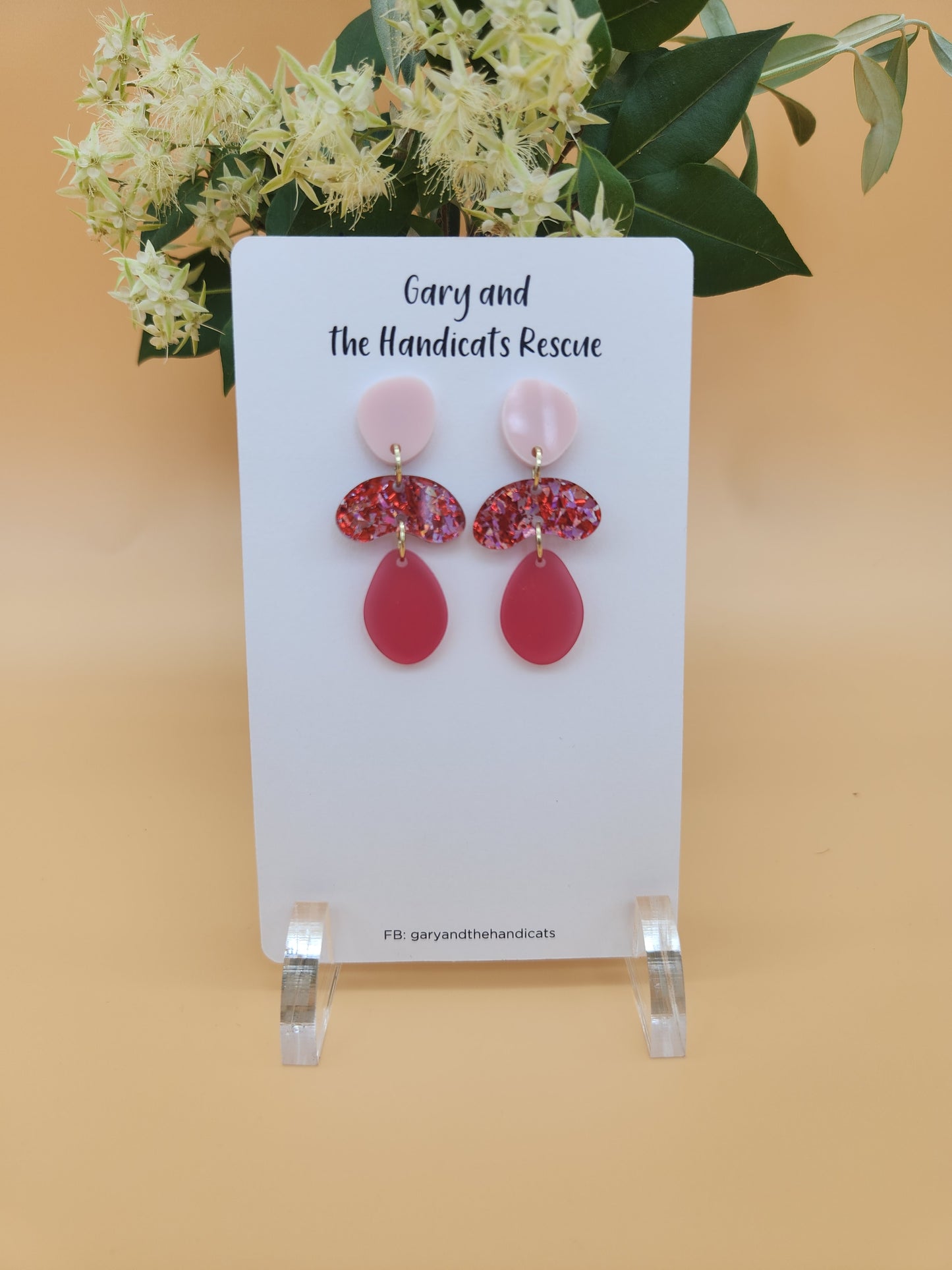 Our 'Love Me' acrylic stud dangle earrings